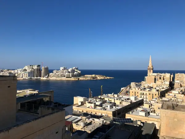 Homes for sale in Malta: Historical Corner Palazzo for sale in Valletta with Roof Terrace and Views