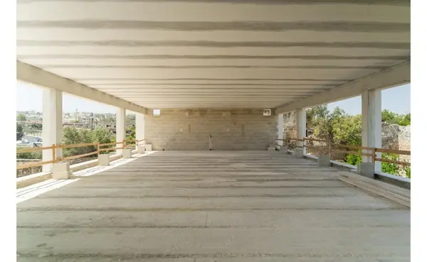 Qormi Commercial Centre with a total footprint of 2500sqm , surrounded by gardens
